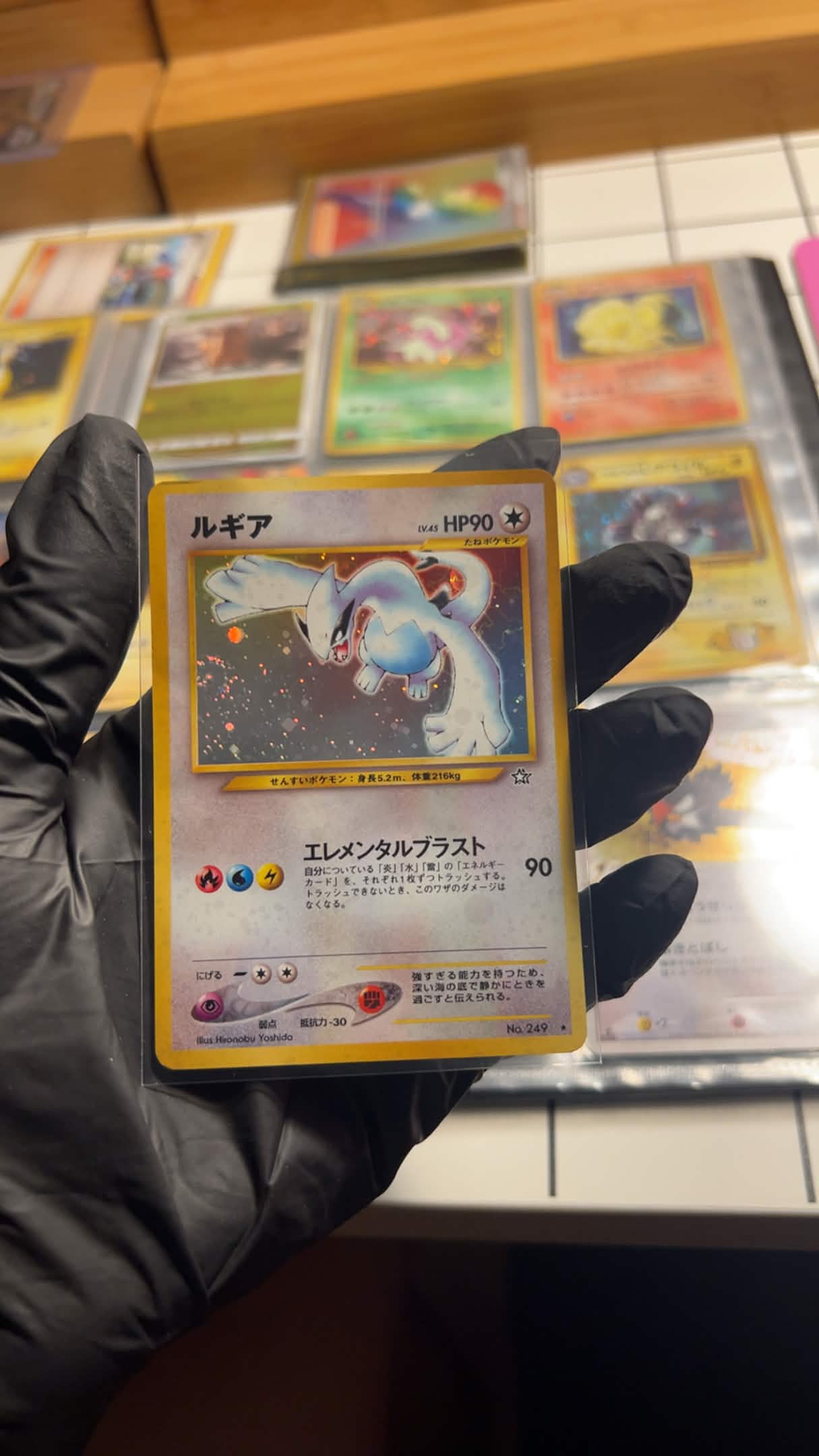 Professional Pokemon card restoration in progress